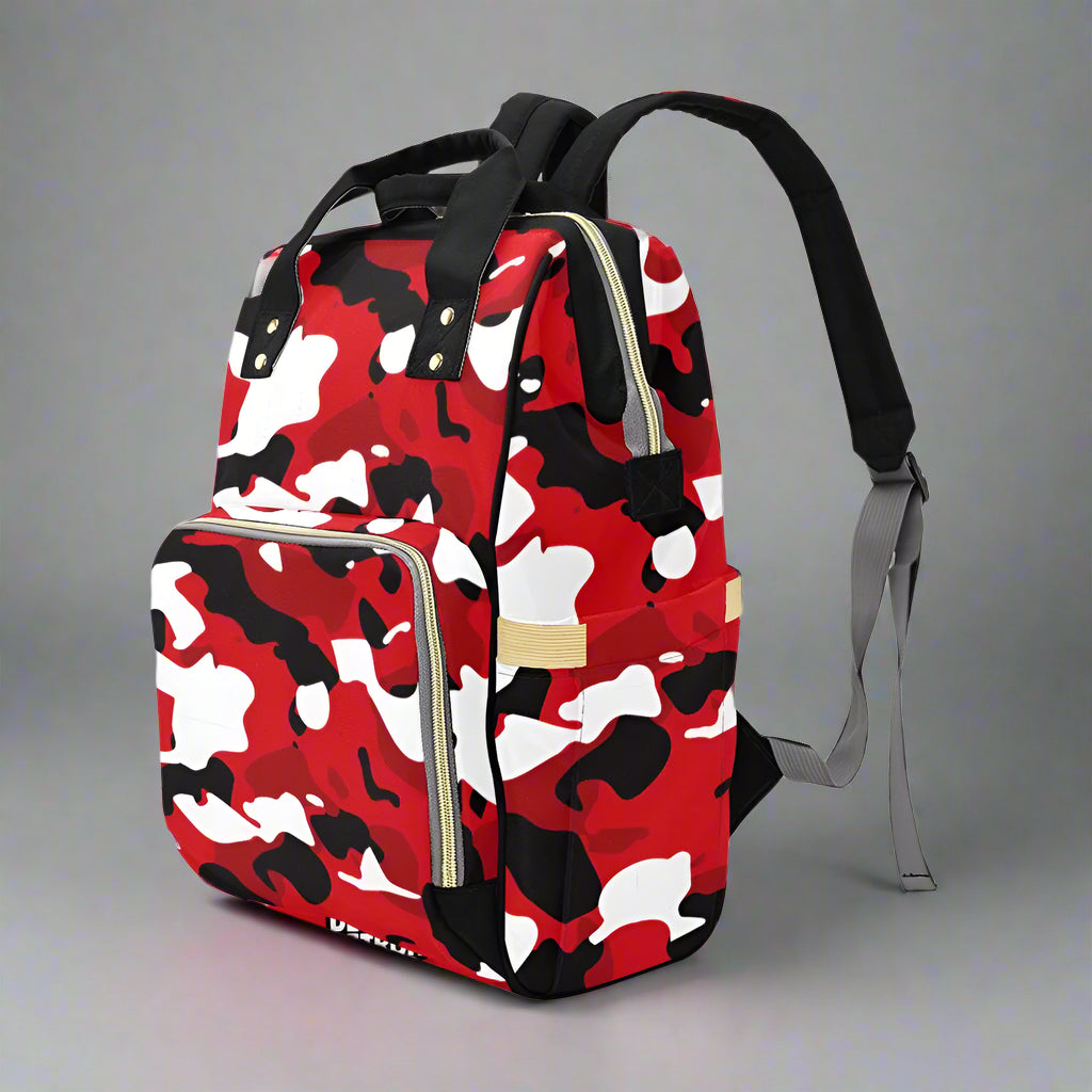 Red, black, and white camouflage backpack on a white background
