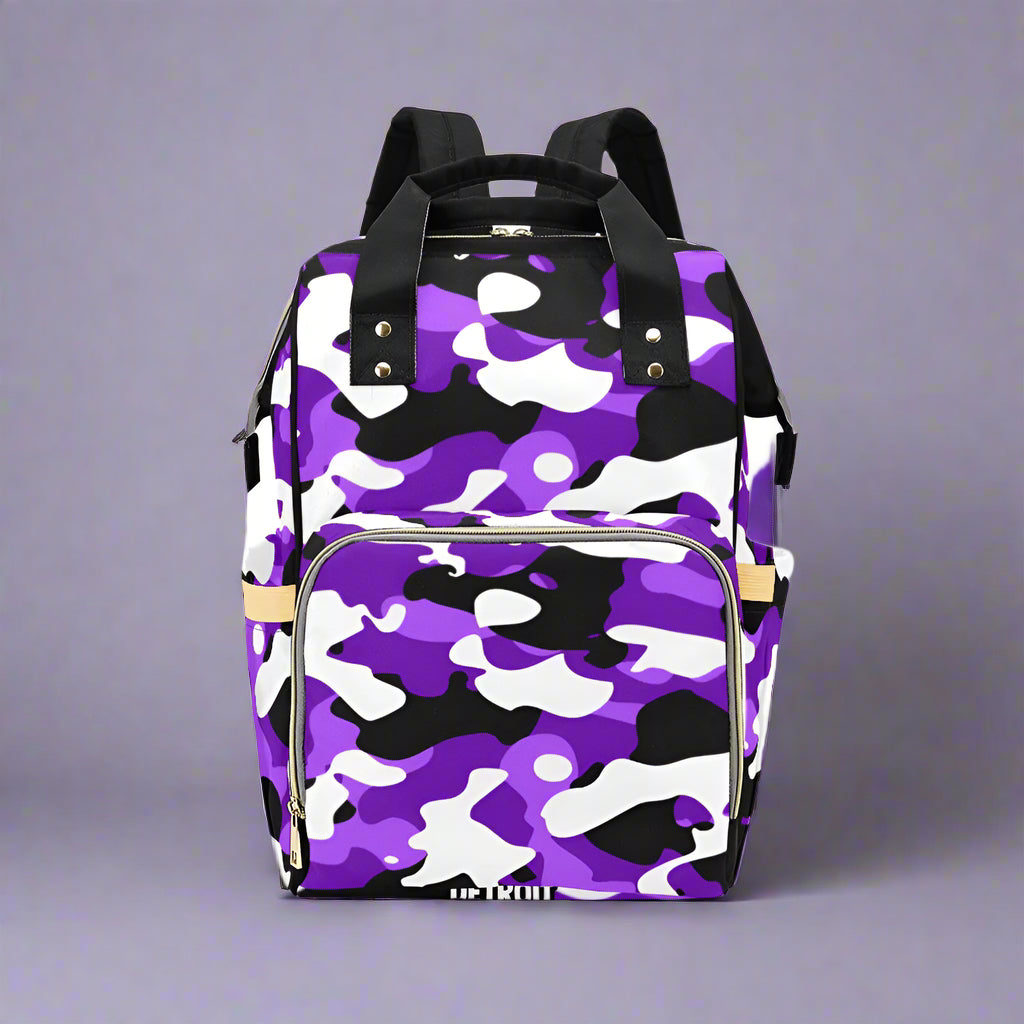 Purple camouflage backpack with black straps on a white background