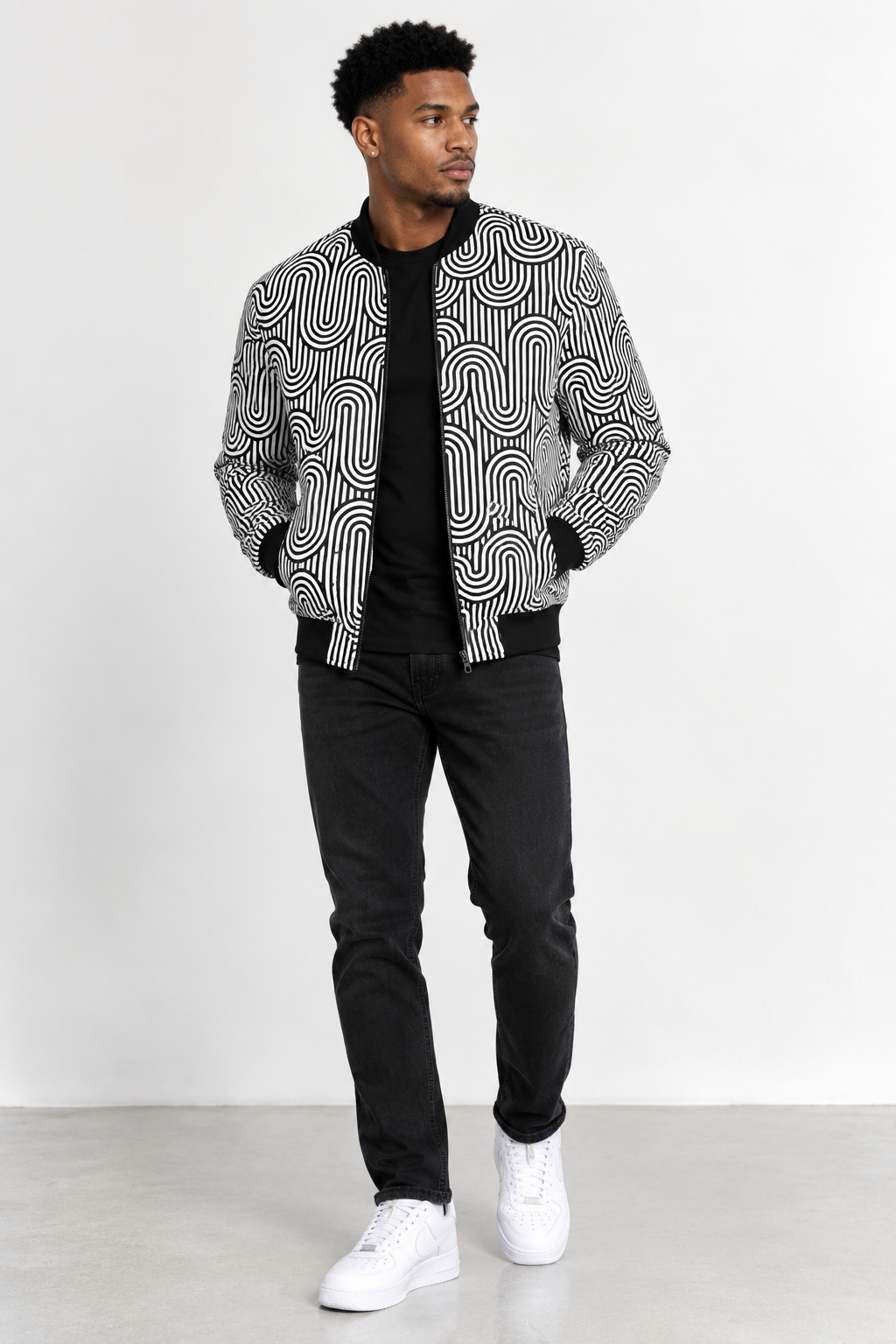 Model wearing the Detroit Monochrome Pattern bomber jacket, front view