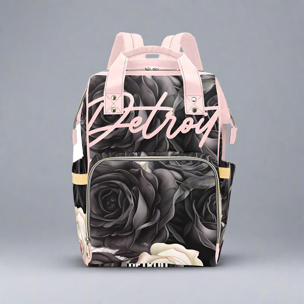 Backpack with rose design and 'Detroit' text on a white background