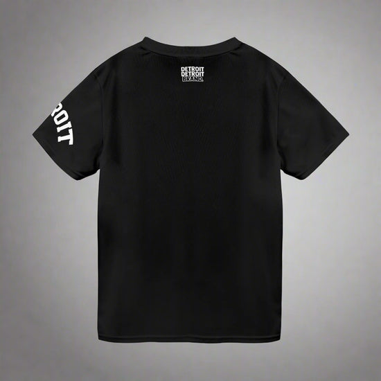 Black t-shirt with text on the back and sleeve, on a white background