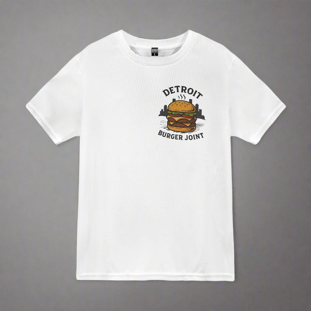 "White short-sleeve t-shirt laid flat on a gray background. The front of the shirt features a &