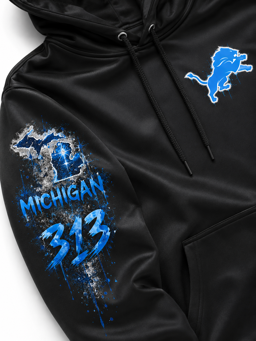 Black hooded sweatshirt with blue and white Detroit Lions graphics, featuring a large Michigan 313 print on the right sleeve and the Detroit Lions logo on the left chest.
