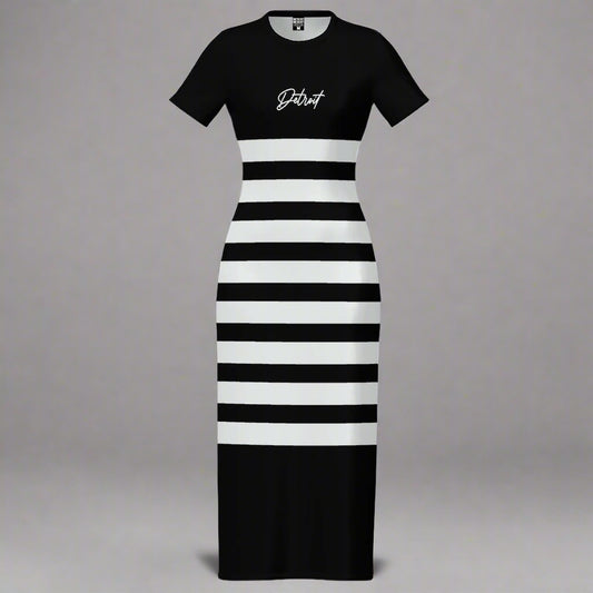 Black and white striped maxi dress displayed flat against a gray background. The dress has short sleeves and features a solid black top with the word 'Detroit' printed in white cursive text on the chest. The lower portion of the dress consists of alternating horizontal black and white stripes, creating a bold, modern look.