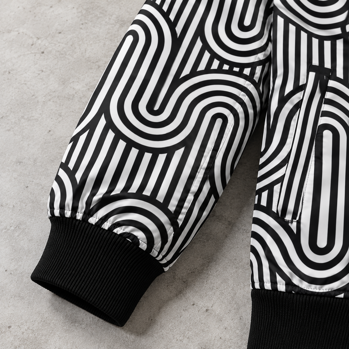 Close-up of the ribbed cuff on the Detroit Monochrome Pattern bomber jacket