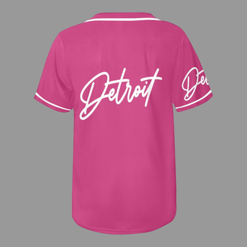 Pink baseball jersey with white button-up front, white trim, and “Detroit” written in white script on the chest and sleeve.