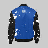 Blue jacket with black sleeves and white splatter patterns on a white background