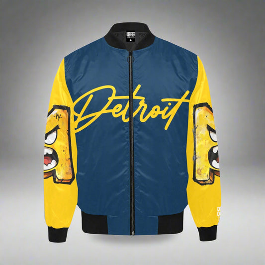 Blue and yellow Detroit bomber jacket featuring large yellow “Detroit” script across the chest and cartoon-style angry face graphics on both sleeves, with black collar, cuffs, and waistband.