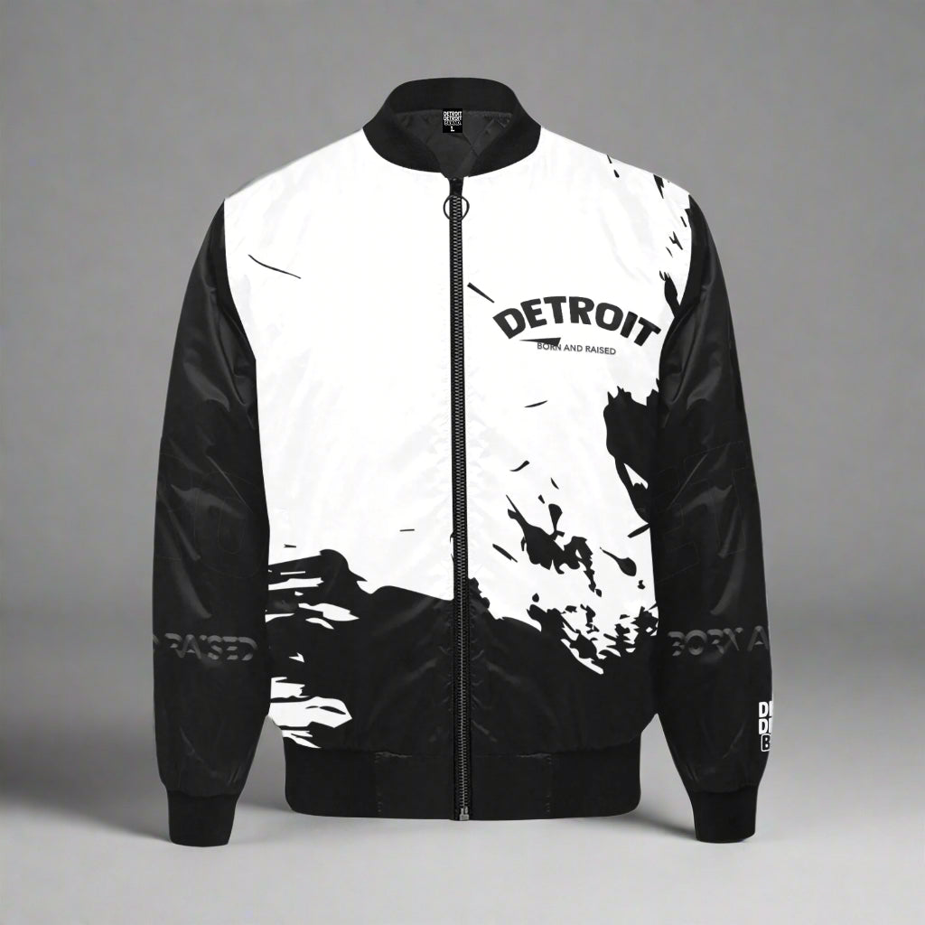 Black and white Detroit ‘Born and Raised’ splash-design bomber jacket with full front zipper and monochrome streetwear style