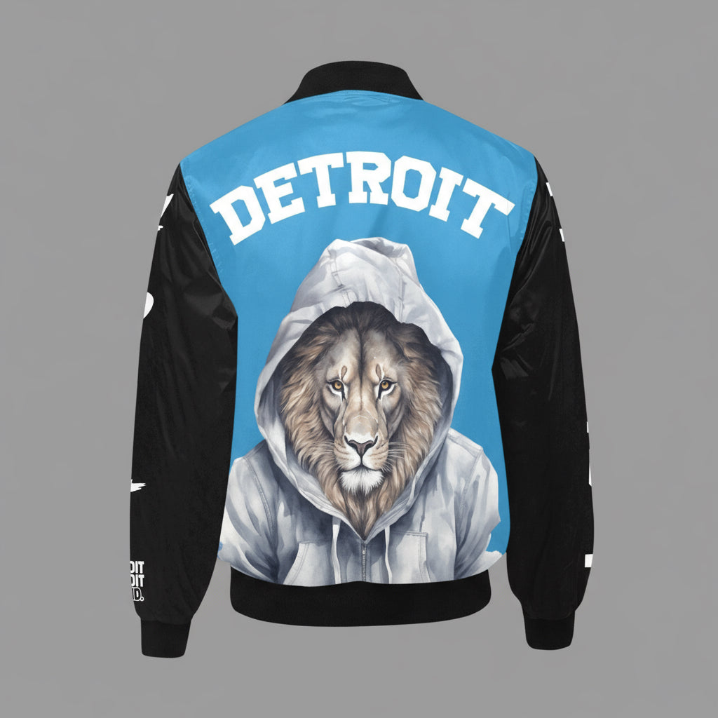 Back view of a blue and black bomber jacket featuring a large, detailed illustration of a lion wearing a gray hoodie and bold white “Detroit” lettering across the upper back.