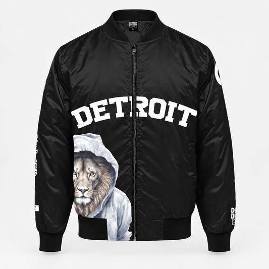 Front view of black Detroit Lion Graphic Bomber Jacket with oversized white Detroit lettering and printed artwork.