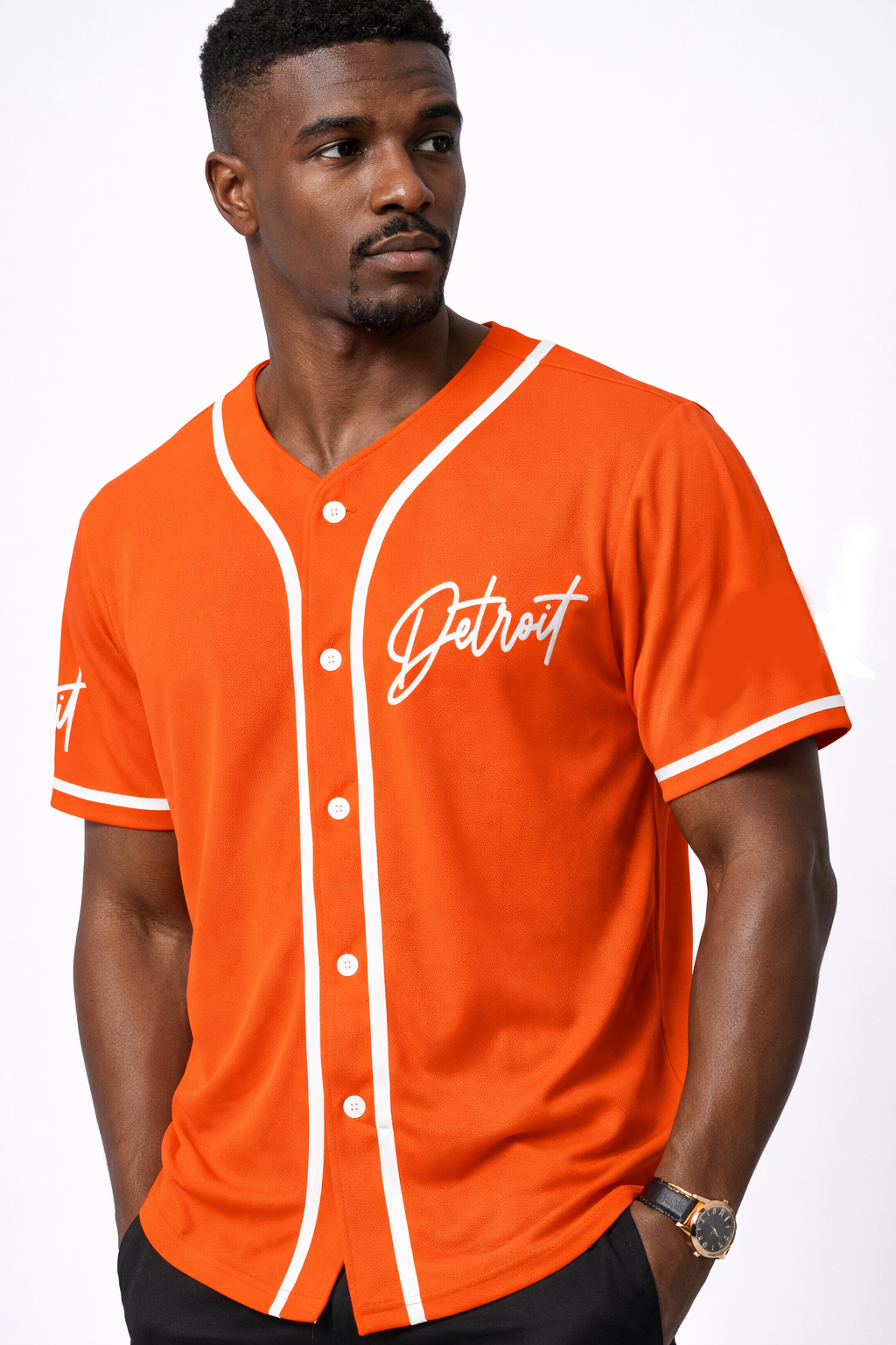 Close-up front view of men’s orange Detroit baseball jersey featuring white piping, button front, and Detroit script logo