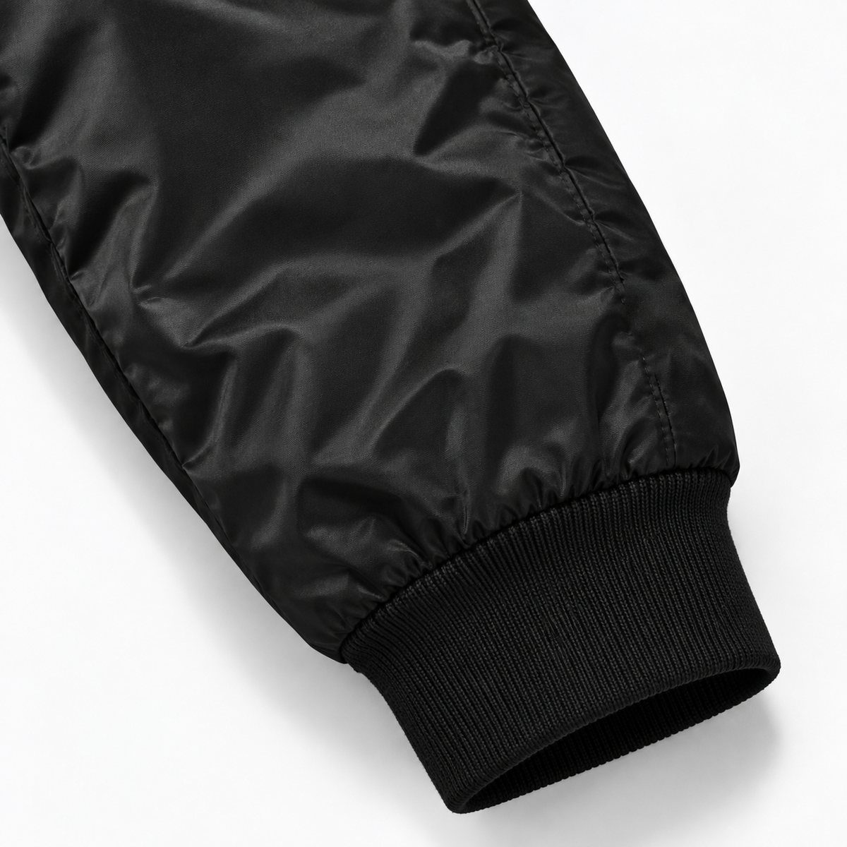 Close-up of black polyester sleeve and ribbed cuff on Detroit Script Bomber Jacket