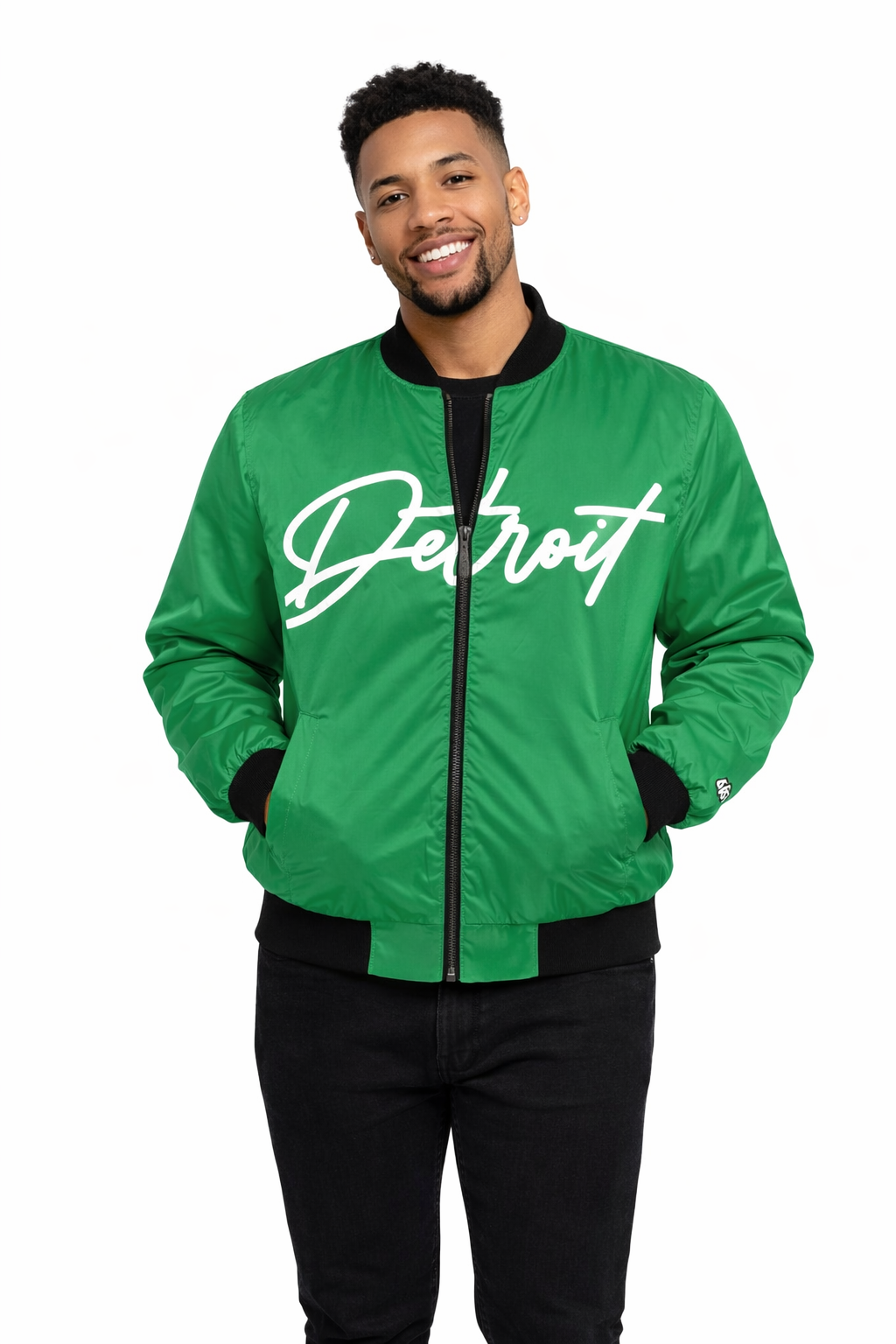 Male model wearing emerald green Detroit script satin bomber jacket with white lettering on a white background