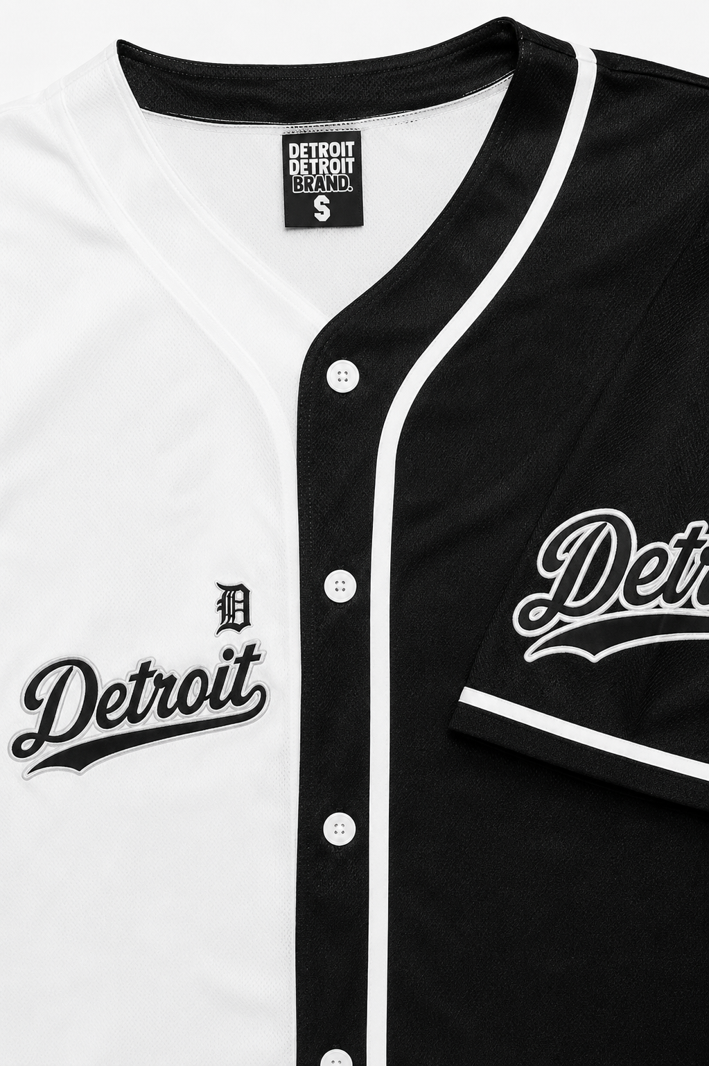 Close-up of Detroit Split Script Baseball Jersey logos buttons and fabric