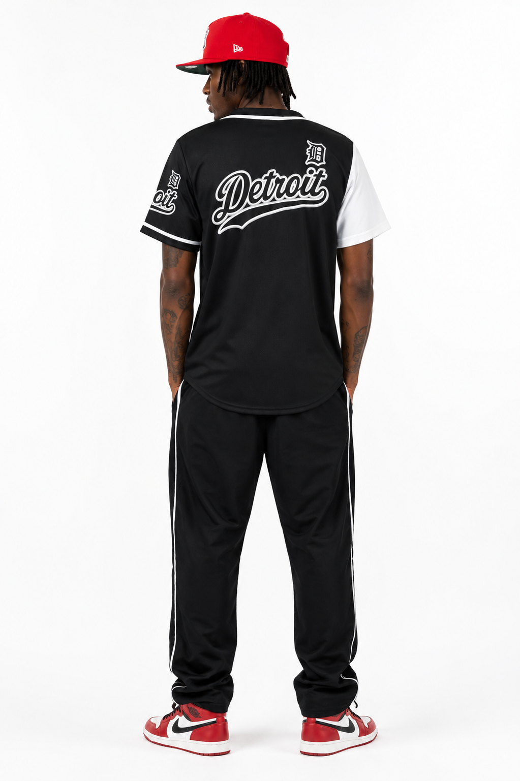 Male model wearing Detroit Split Script Baseball Jersey with large back logo