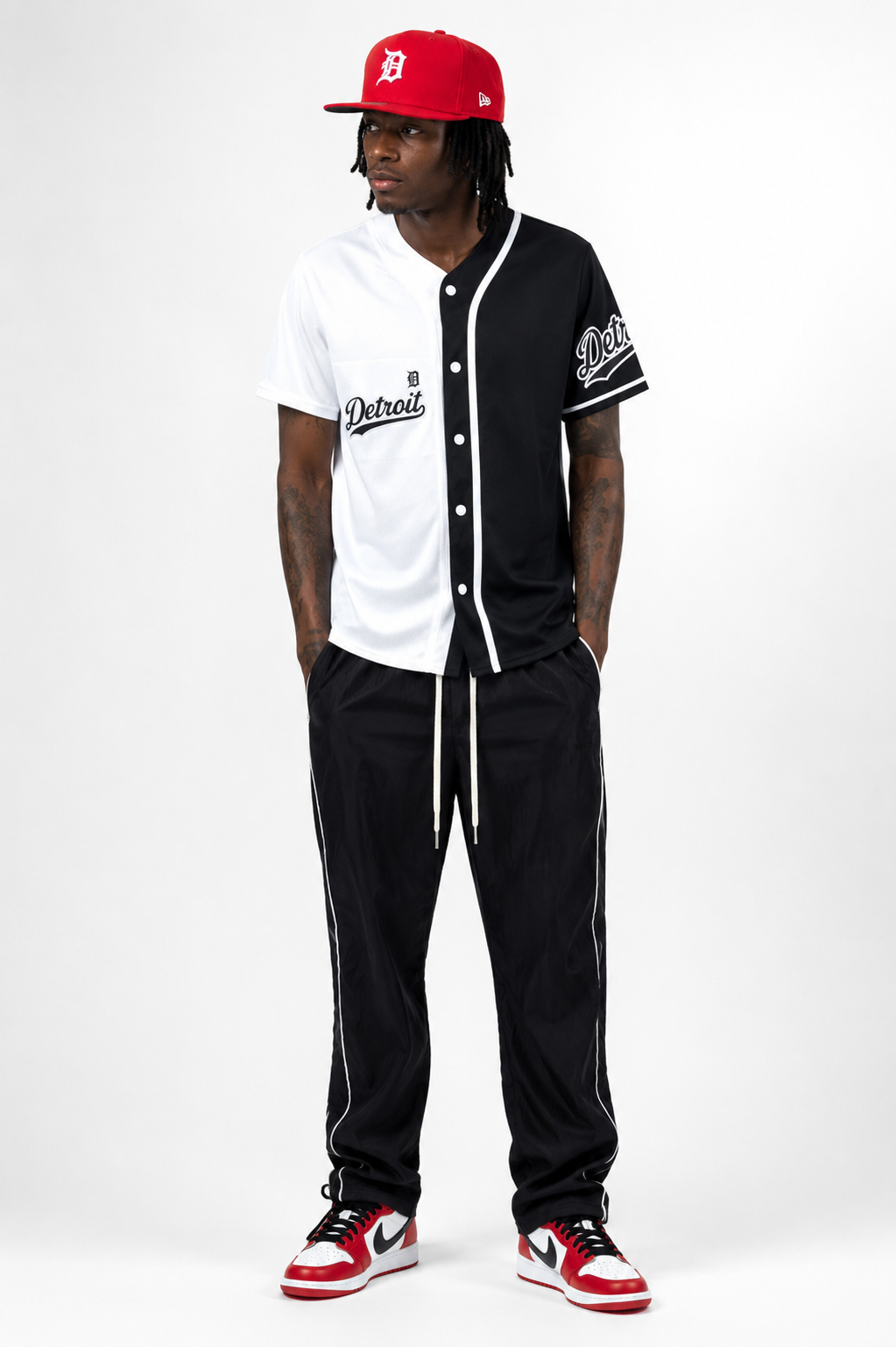 Male model wearing black and white Detroit Split Script Baseball Jersey front view