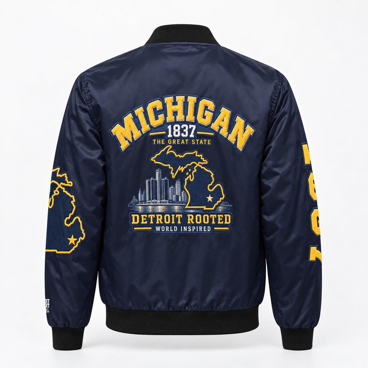 Back view of Michigan Detroit Rooted Bomber Jacket featuring Michigan 1837 and Detroit Rooted World Inspired printed artwork